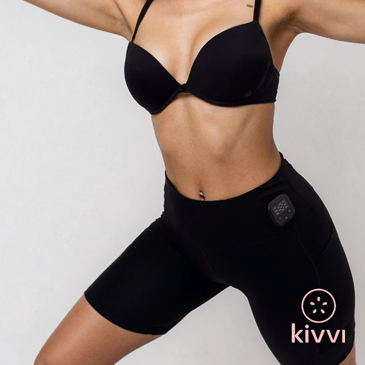 Person wearing black athletic shorts with a Kivvi logo on a light gray background